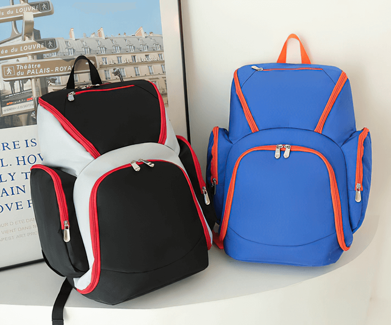Waterproof lightweight football backpacks in black and blue with red accents, ideal for sports gear with spacious compartments.
